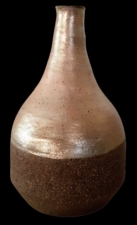 Black clay vase with gold